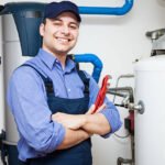 Technician servicing an hot-water heater